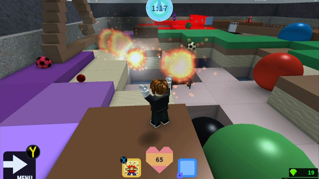Boneco de Roblox com os braços levantados para o alto em meio a um labirinto colorido e com bolas gigantes